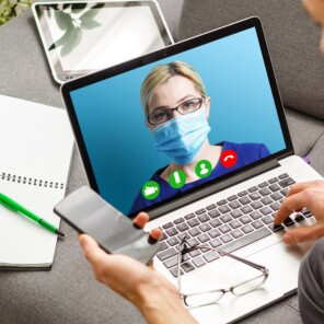 Woman in mask on virtual call