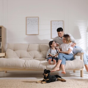 Man with his family on a couch