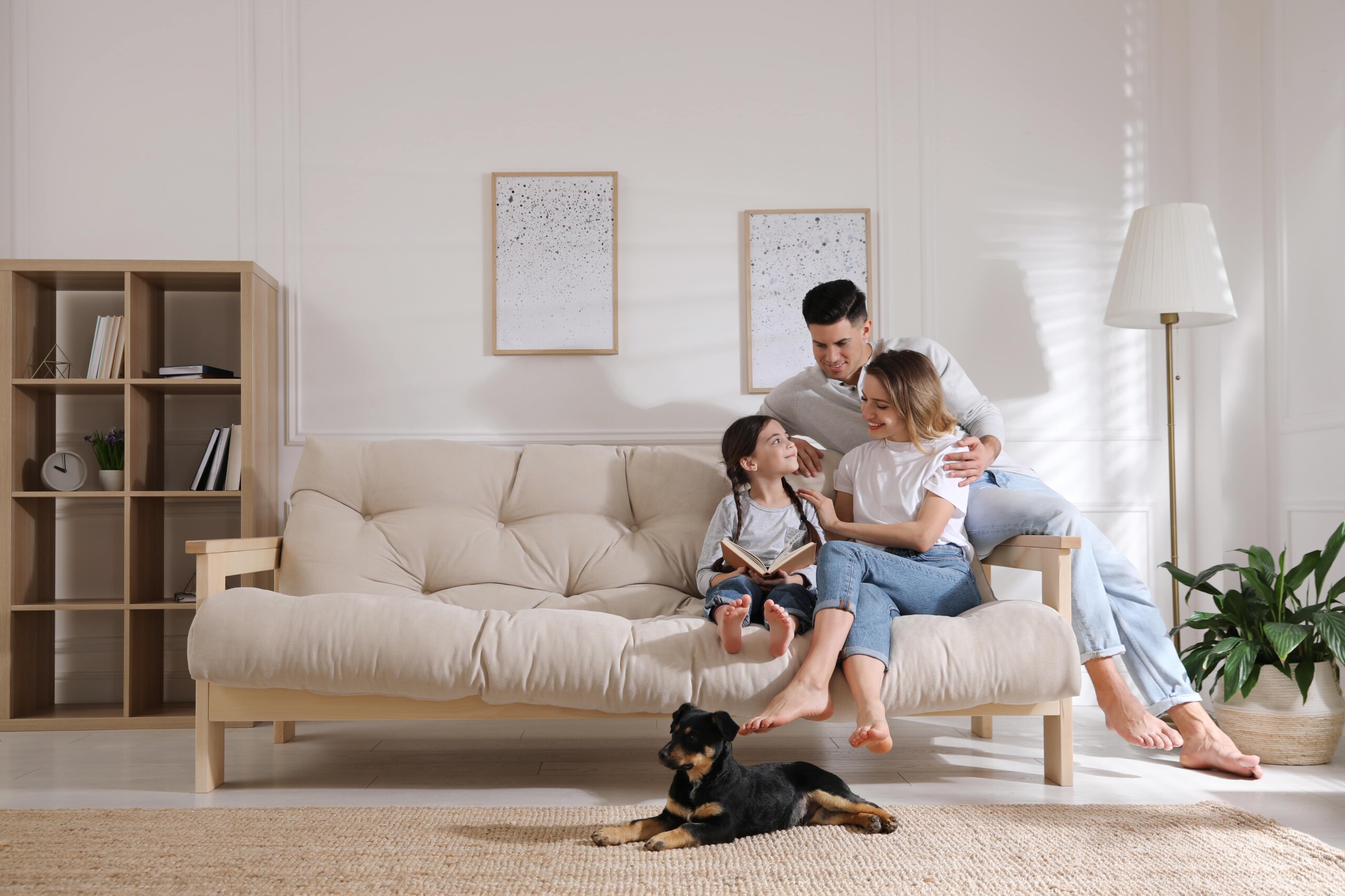 Man with his family on a couch