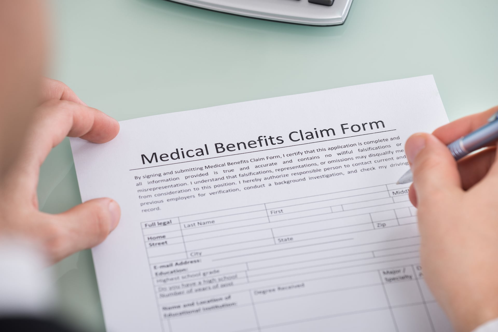 Filling out a medical claim form