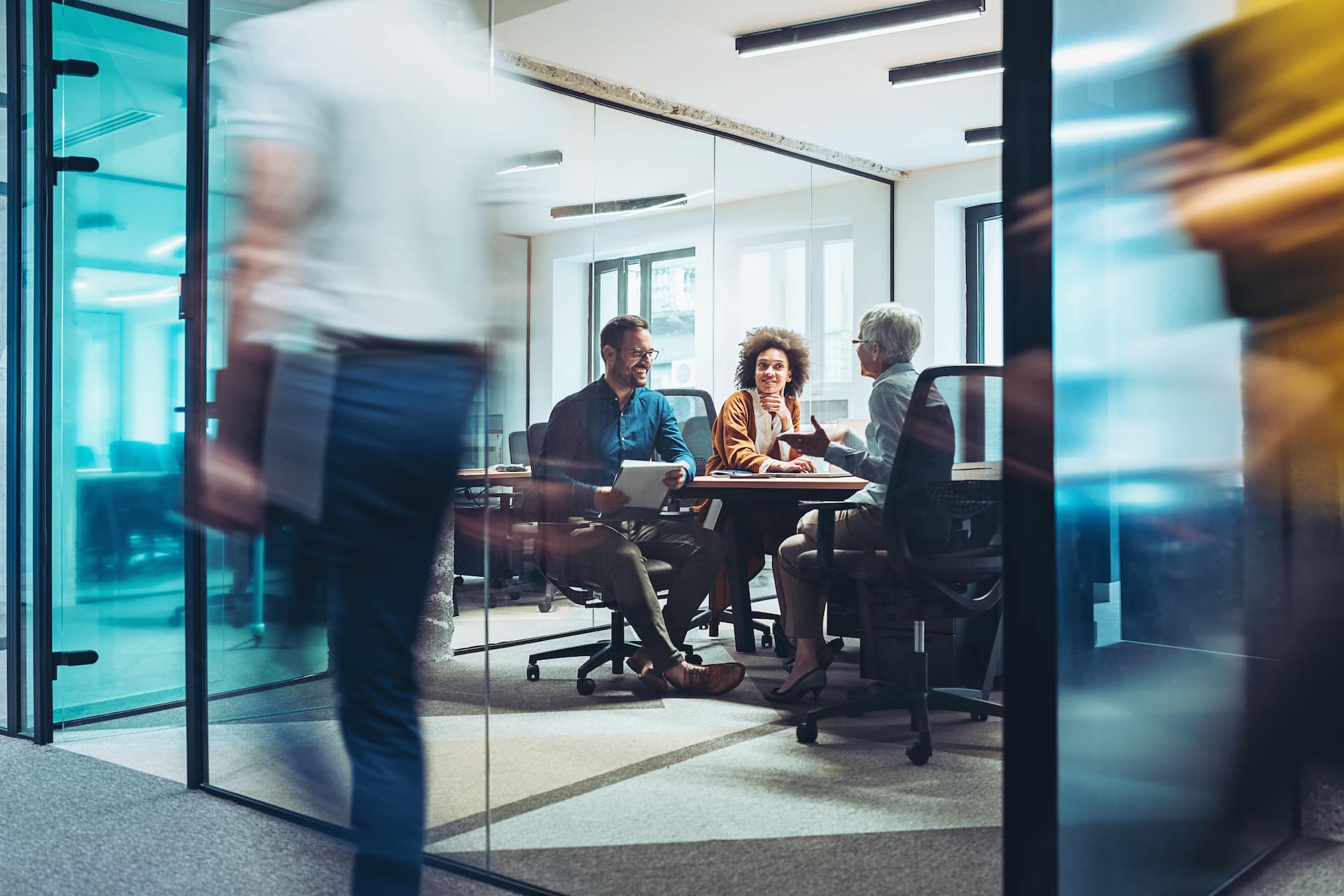 Team working in glass office